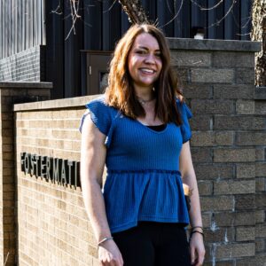 Ashley Ritchey, Vice President and Office Manager at Fostermation, smiling in a professional setting representing manufacturing leadership and office management.